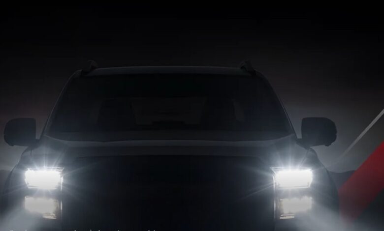 A mysterious off-road vehicle poised for adventure in a romantic, rugged landscape.