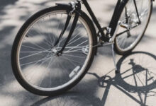 A 92-year-old British man riding a bicycle, symbolizing freedom and vitality in old age.