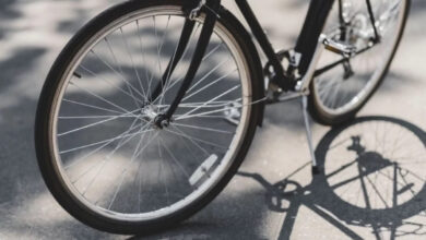 A 92-year-old British man riding a bicycle, symbolizing freedom and vitality in old age.