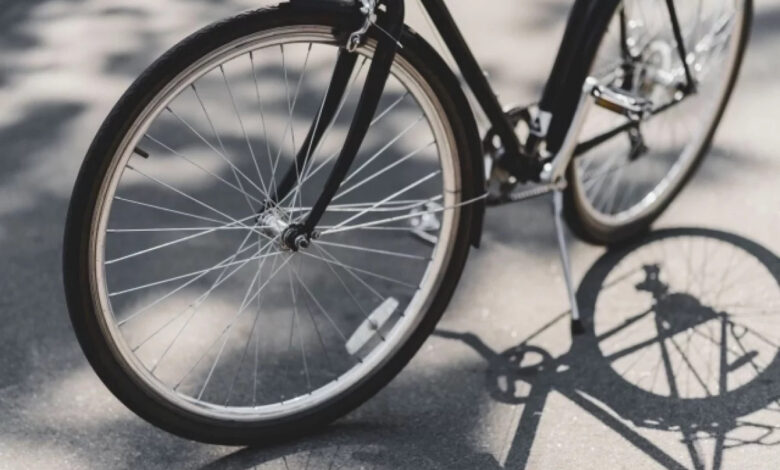 A 92-year-old British man riding a bicycle, symbolizing freedom and vitality in old age.